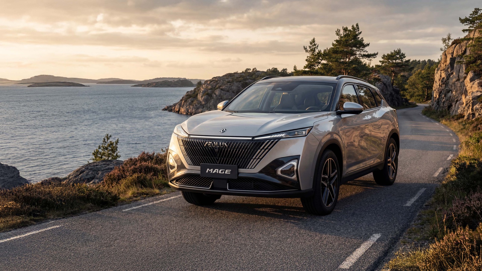 Silver Dongfeng Mage SUV on a coastal road at sunset