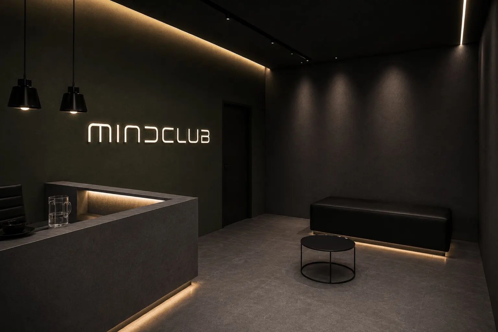 Mindclub's dark, minimal reception with an illuminated sign
